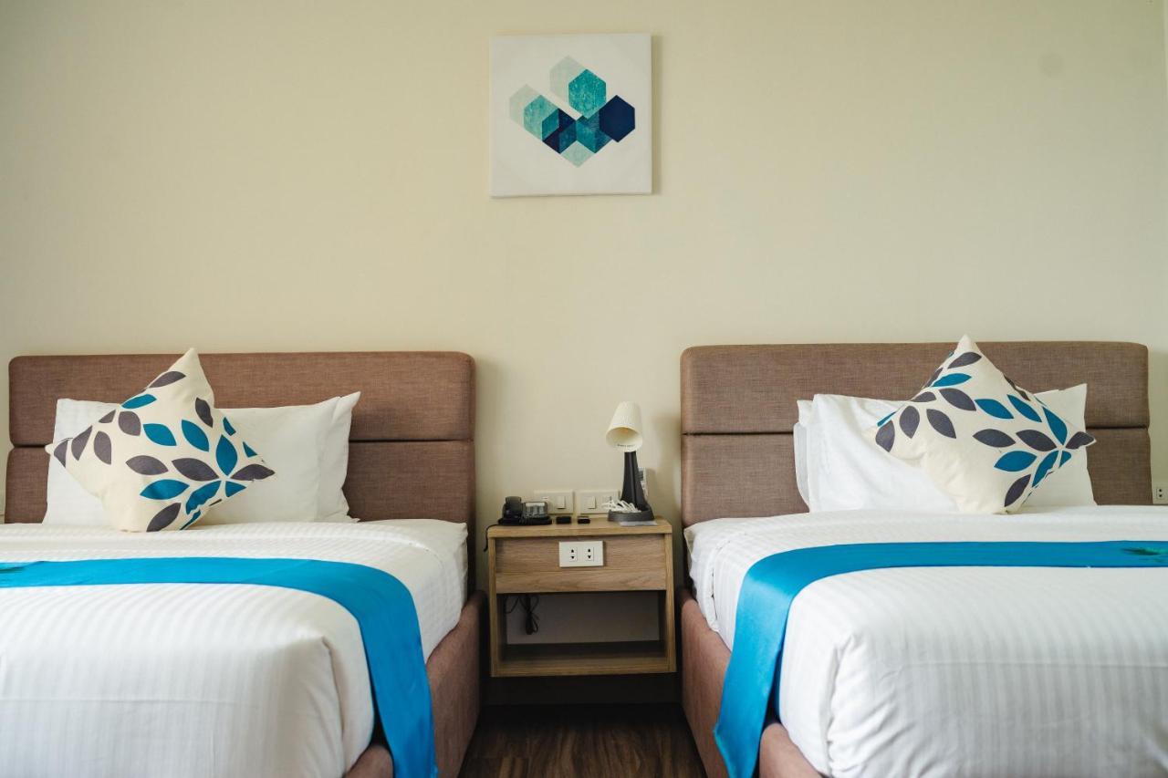 River Palm Hotel And Resort Powered By Cocotel Bugallon ห้อง รูปภาพ